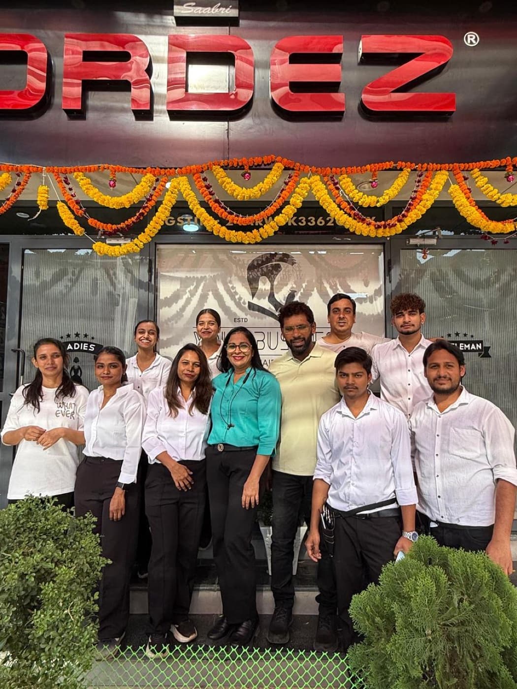 The Mordez storefront on Morarji Circle Road, with the team outside